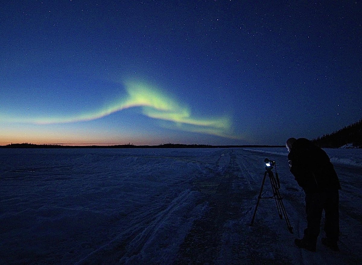 Here is a very cool photo we took on a May 1st a few years ago, Aurora AND sunset!! Only in Yellowknife!
