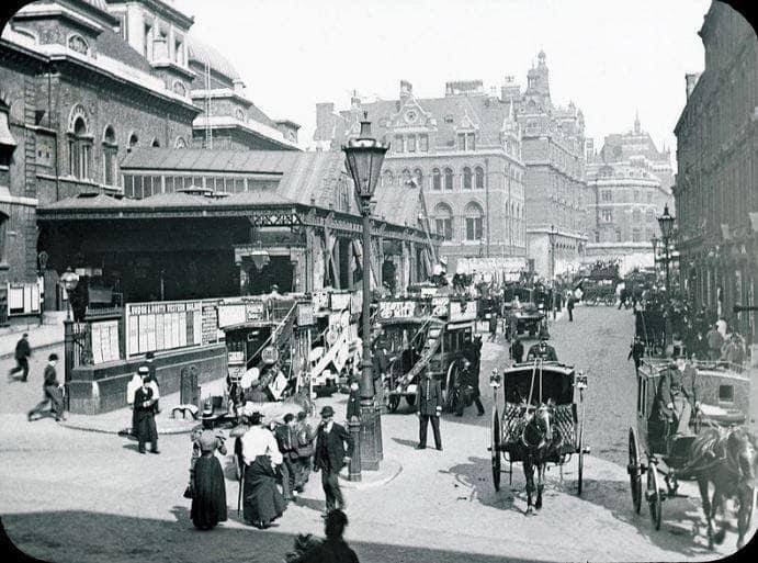 Broad Street Railway Station. Magic lantern slide dating c1880s & shows animated scene outside Railway Station with Great Eastern Railway Hotel at Liverpool Street Station in background. City of London police constable standing in Liverpool Street amidst Hansoms and Growlers.