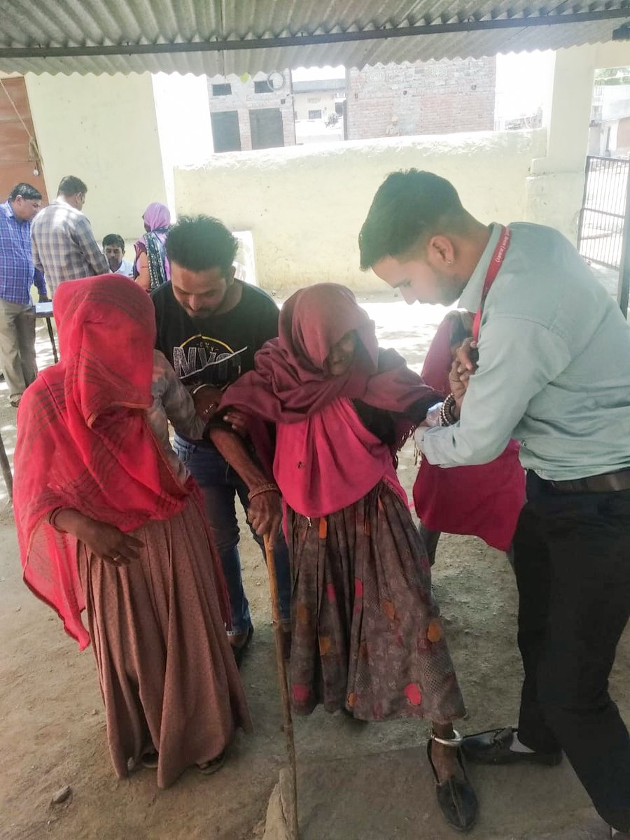 Ajmer, An elderly voter arrives to cast her vote during repolling at polling booth in Nandsi in Ajmer parliamentary constituency for the Lok Sabha elections, in Ajmer on Thursday.