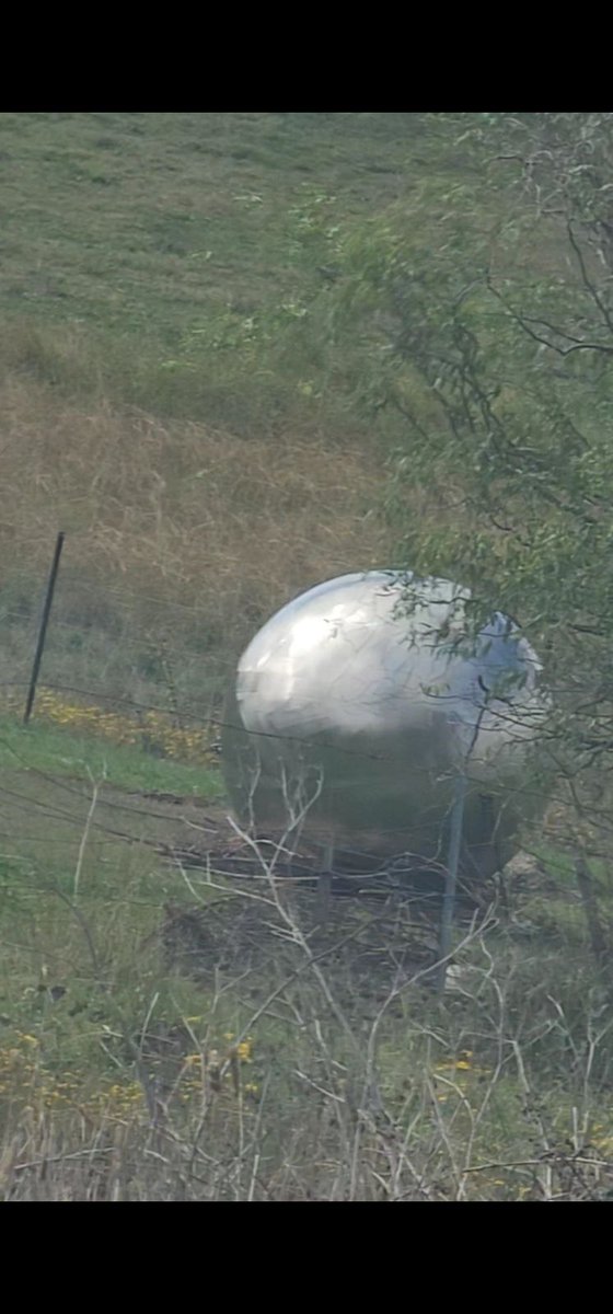 Huge metallic silver sphere, found on Australian farm. Witness is too spooked to get a closer look. The 'sphere' is approx. 4-5 feet in diameter. I'm trying to exclude the possibility of it being a Lincoln Calibration Sphere. #ufoX #uapX