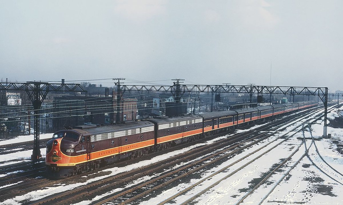 Good morning, America. How are you? Illinois Central 4036 with Train 1, The City of New Orleans at Grand Crossing overpass, Chicago, IL on March 31, 1964 Roger Puta Collection Description by Marty Bernard Public Domain 🇺🇸