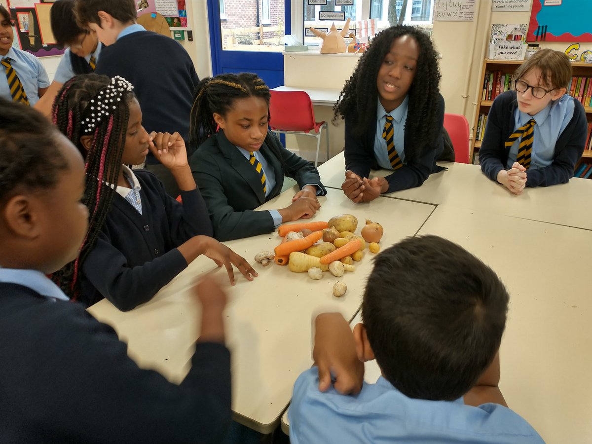 Class 6 worked in groups to make still life sculptures using vegetables based on the work of Arcimboldo. We then made photographic images of them.