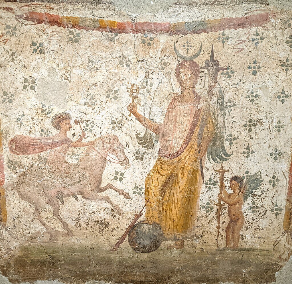 #FrescoFriday - A dapper lararium panel depicting Isis-Fortuna. She holds a cornucopia and sistrum, with her foot resting on a globe against which a rudder leans. From the House of Philocalus, Pompeii (IX.3.15). #Pompeii #Art

Image: National Archaeological Museum, Naples (8836)