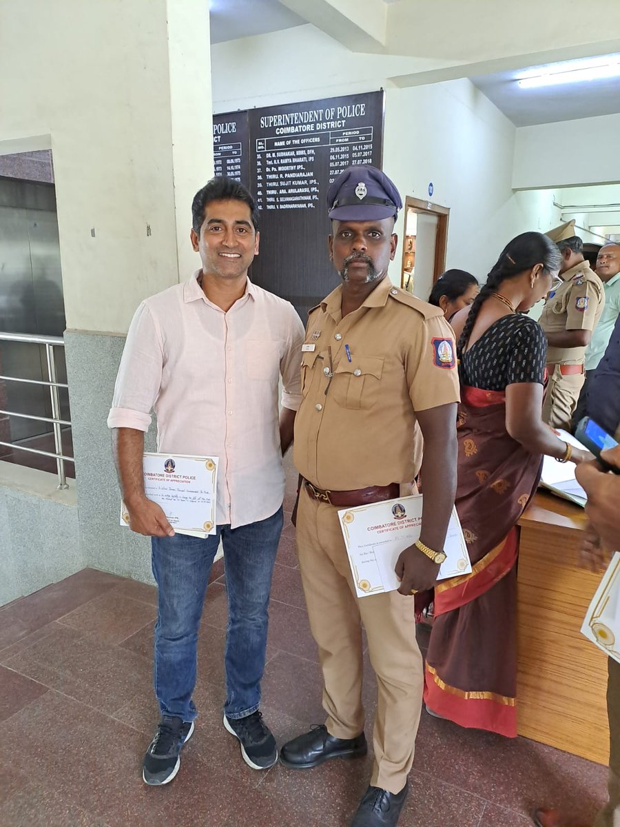 The Hindu journalist Wilson Thomas aks Labour Department 'Adhikari' and Constable Vel were honoured by Coimbatore Superintendent of Police today for their roles in saving a tea estate worker.