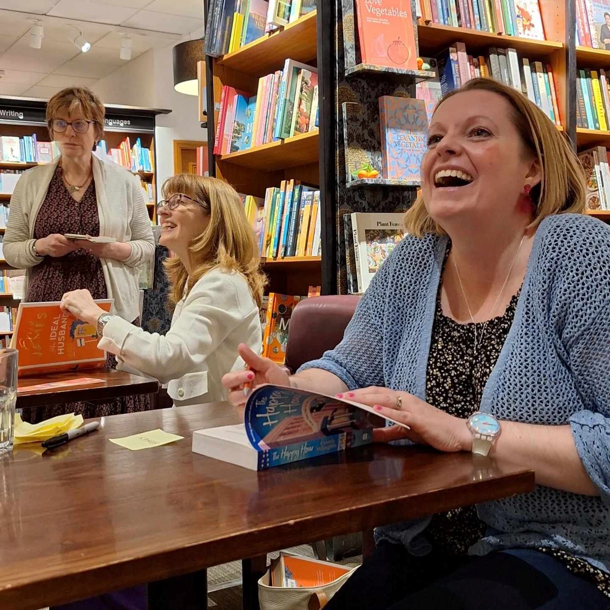Thanks to @NorwichStones for hosting @CressMcLaughlin and @TheEricaJames in conversation with @Rachelhore last night. What a lovely event and signing queue! #TheHappyHour is out next Thursday ☀️