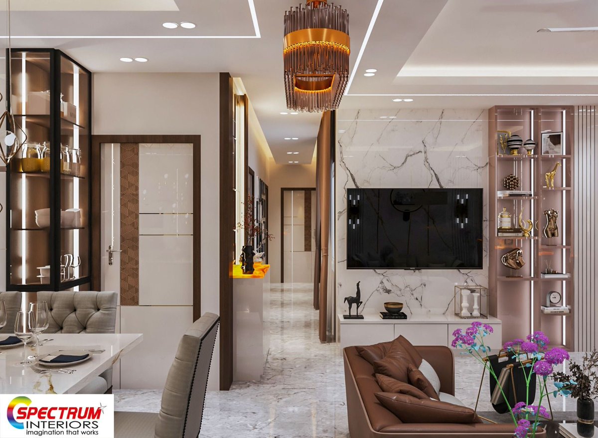 A total example of a #LivingRooms with #EntertainmentUnit, #Lighting, and #Dining Ideas to make it aesthetic-friendly and truly exquisite for impressing your guests.

#LivingRoom #LivingRooms #HomeInteriorDesigner #BestInteriorDesignerinKolkata
#HomeInteriorDesignerinKolkata