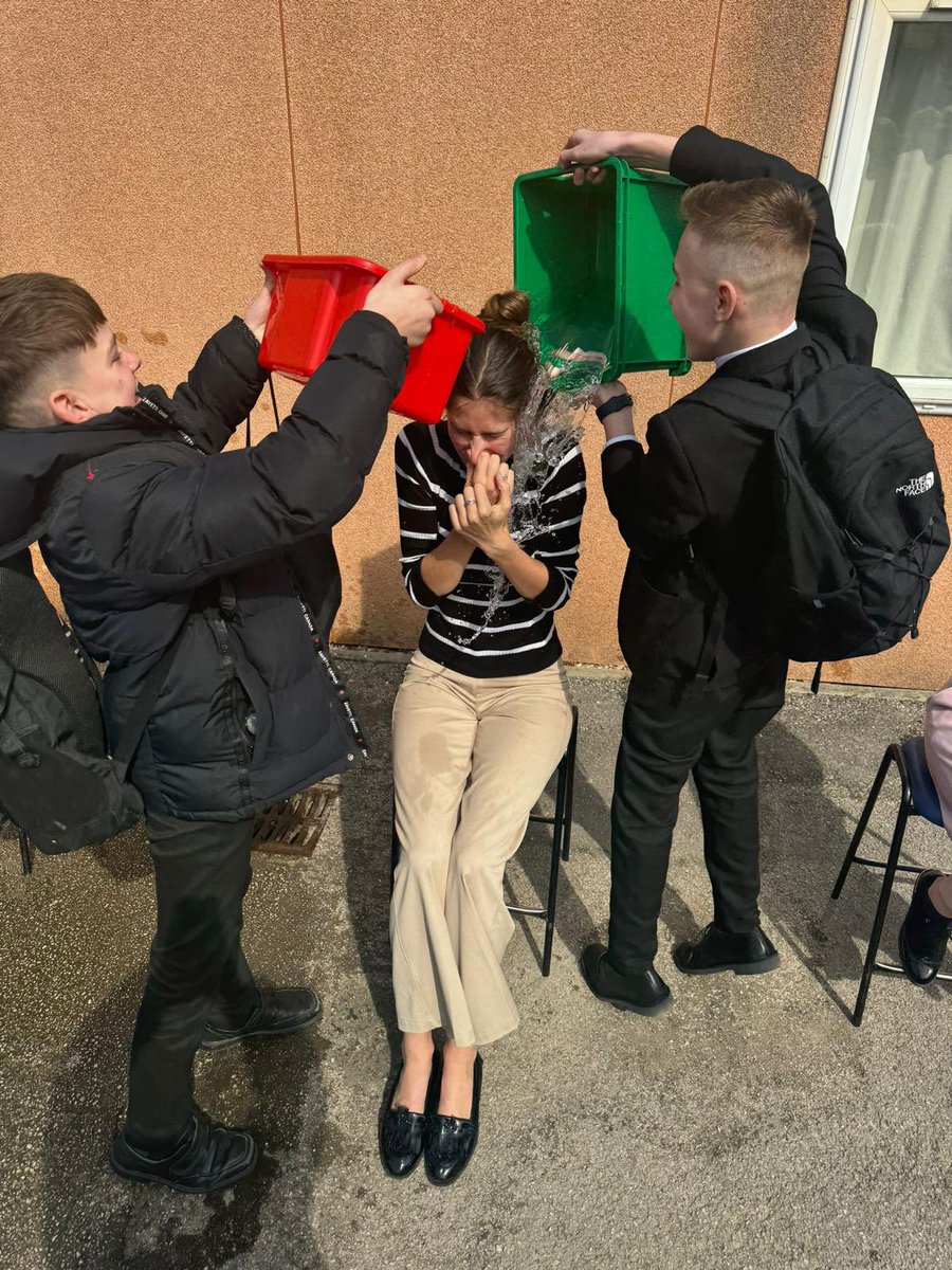 As part of our fundraising for Y8 Graduation some staff volunteered to take part in a ‘Soak a Teacher’ event! Students were able to pay for sponges and buckets to soak our teachers with!Mr Mann, Mr Brown and Miss Emmerson were also voted to have a cream pie thrown at their faces!