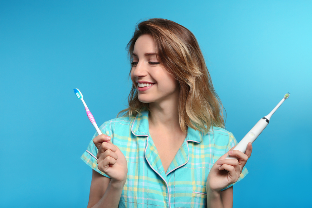 Electric toothbrush tip: Don’t press too hard! Let the bristles glide gently for a safe, effective clean. #HealthySmiles