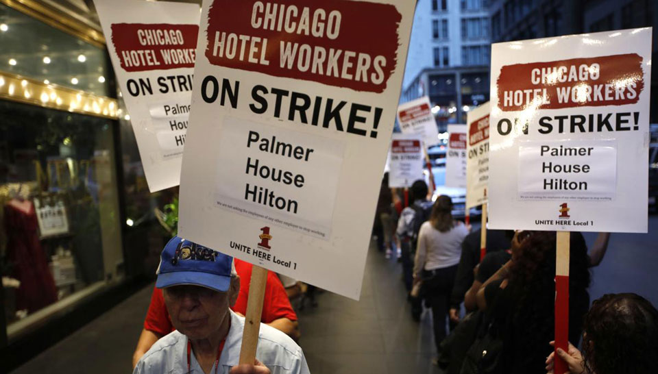 Hotel workers in 18 cities rallied on May Day for better contracts with higher pay. Led by Unite HERE, they demanded fair wages and conditions from Marriott, Hilton, and Hyatt. In America, the International Labor Day originates from an 1886 Chicago protest for an 8-hour workday.