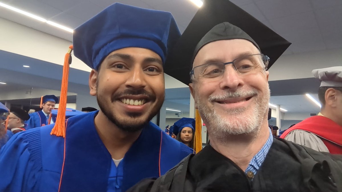 Congrats @amondal_chem for graduating with a PhD from UF chem, first in the group! Sad to miss it, but what a treat to be hooded by @adrian_roitberg !