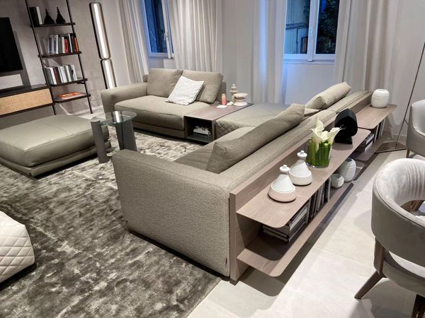 Designed by Mauro Lipparini for Natuzzi, Melpot sofa with its modular components allows for accessories to be added whether in the centre or at the sides.