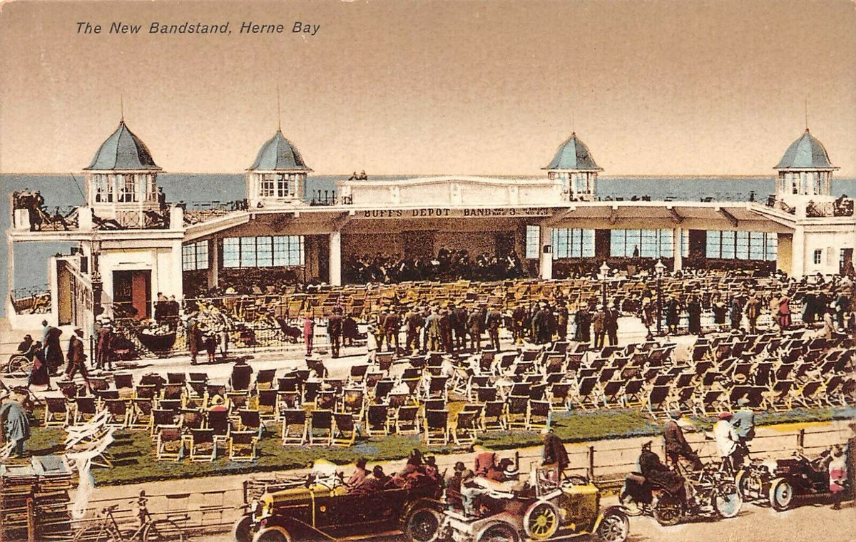 The 1920s #bandstand at #HerneBay soon after it opened. I like how this view shows people listening from parked cars and even a motorbike sidecar. The promenade side of the structure was soon filled in to stop this practice. The bandstand enclosure survives #PostcardOfTheDay