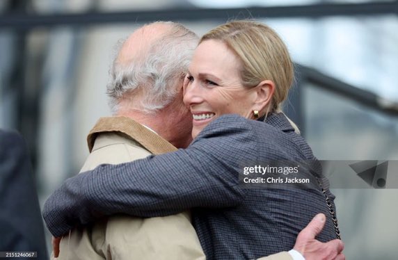King Charles and Zara Tindle share a hug today at the Royal Windsor Horse Show