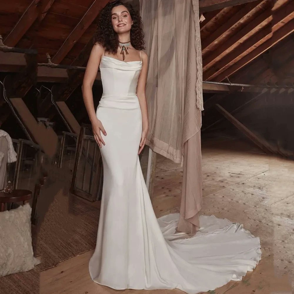 Capture hearts on your special day with our Spaghetti Strap Mermaid Wedding Dress. #allformetoday #womenfashion #womenclothing #bridaldress #weddingdress #bridal #bridalideas #bridaltrends #bridalgown #bridalfashion #weddingdressshopping #empoweringwomen #girlpower #mothersday