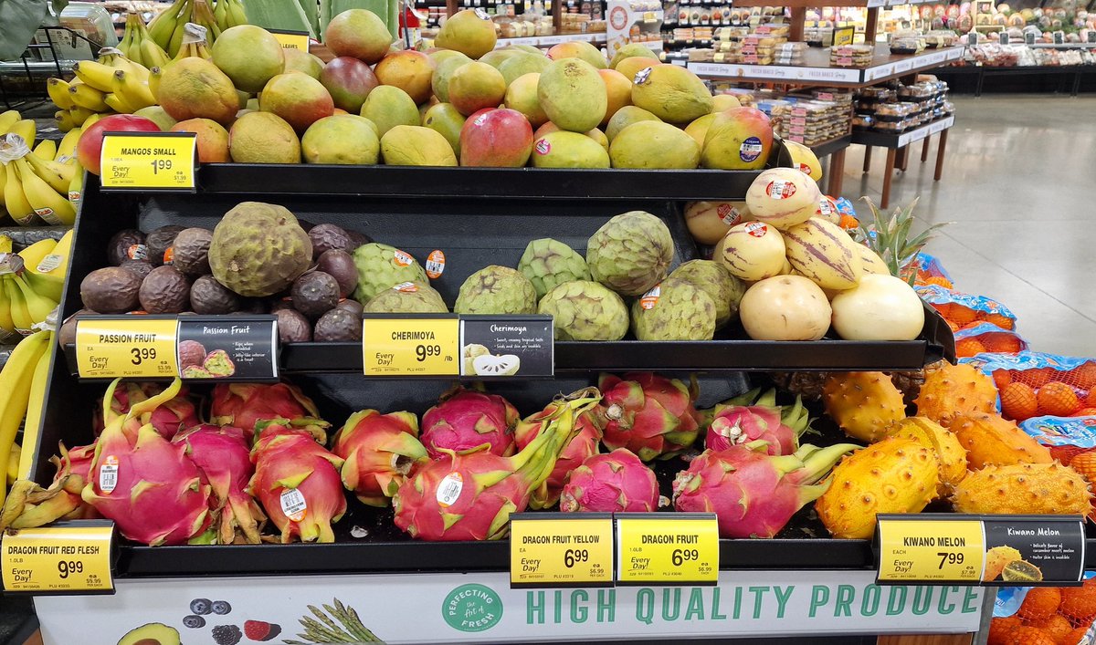Wonderful choice of fruits in a 'normal' American supermarket includes Dragonfruit, Cherimoya, Kiwano Melon, Passionfruit & Dragonfruit.
