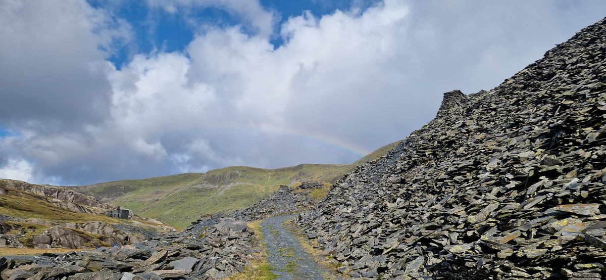 The path up to the Cwmorthin mine entrance, with added rainbow, taken by our lovely trip staff Jonny! 🖤💛🌈 #GoBelow #northwales
