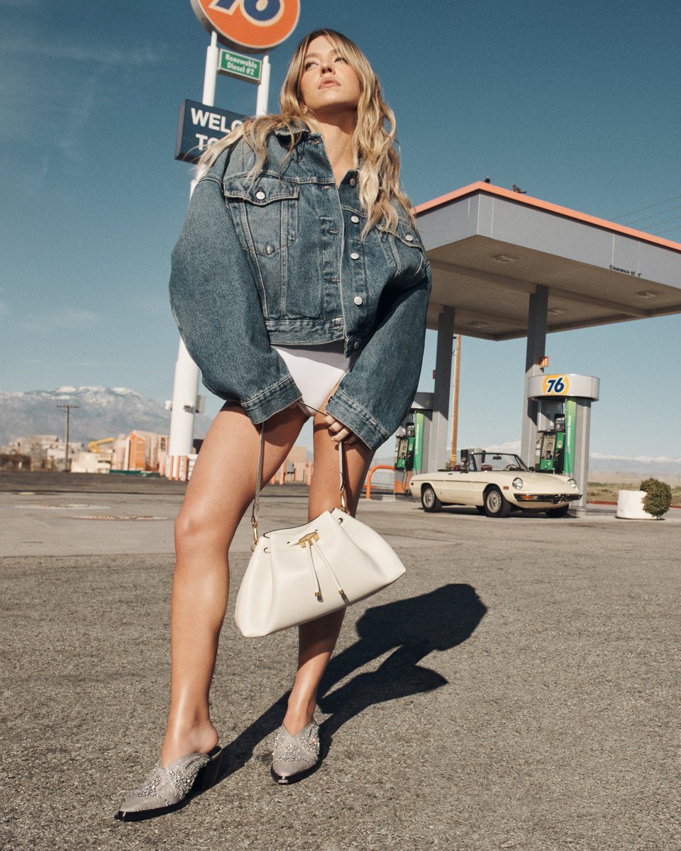 Introducing the Cinch - this new handbag, defined by a 'cinched' silhouette, drawstring closure and diamond clasp, can be styled multiple ways Debuted by campaign star @sydney_sweeney #JimmyChooCinch #JimmyChoo jimmychoo.com/en/summer-2024…