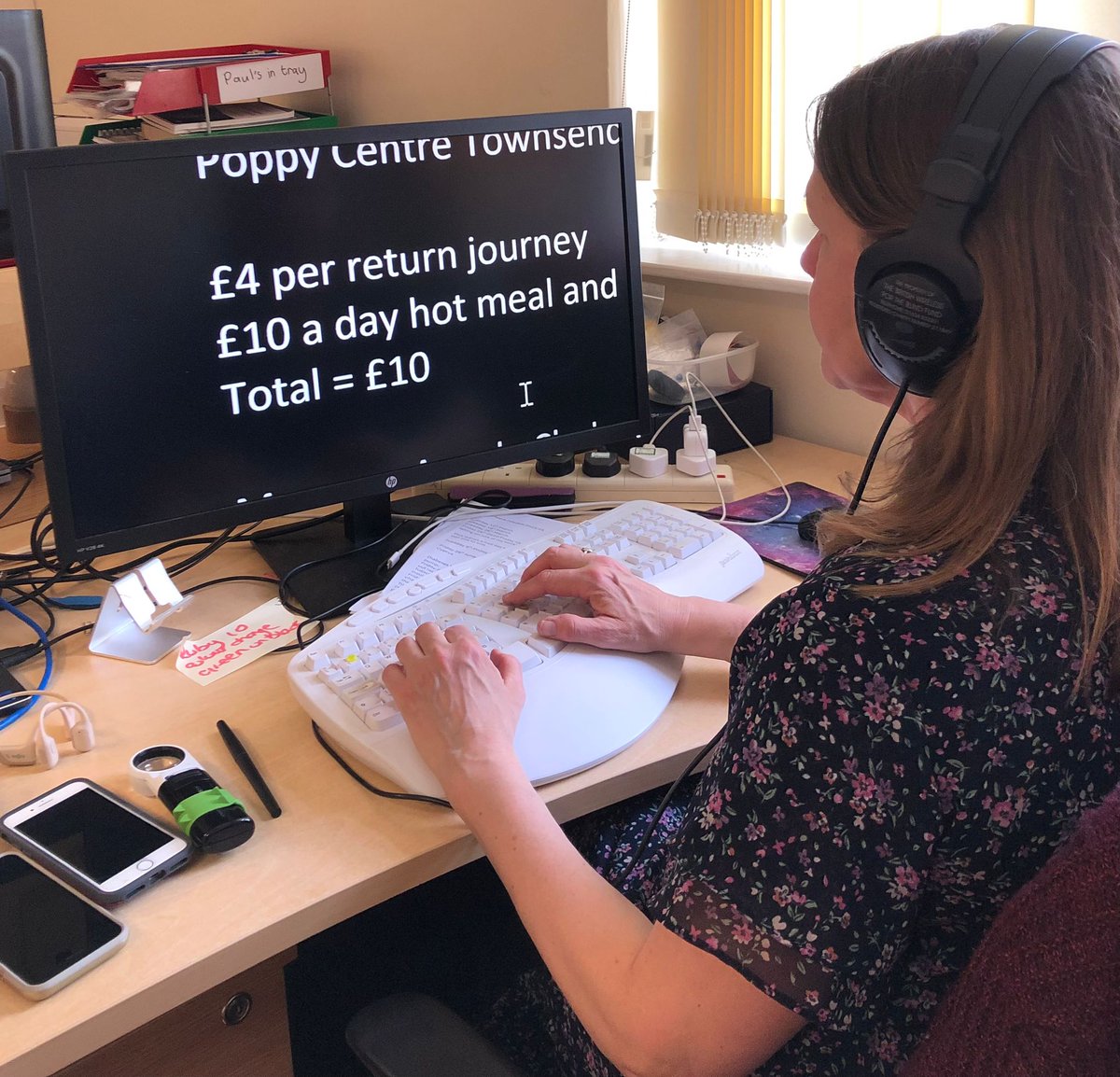 A screen reader is a software programme on a phone or computer, providing auditory feedback of screen content to blind and partially sighted users through audio cues, vibrations, and sound alerts.