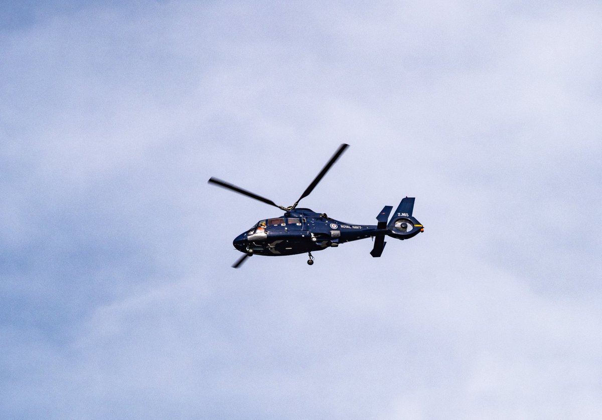 ZJ165 used by FOST seen after taking off from Kinterbury Point Helipad at HMNB Devonport, and heading for FGS Ludwigshafen am Rhein out at sea.