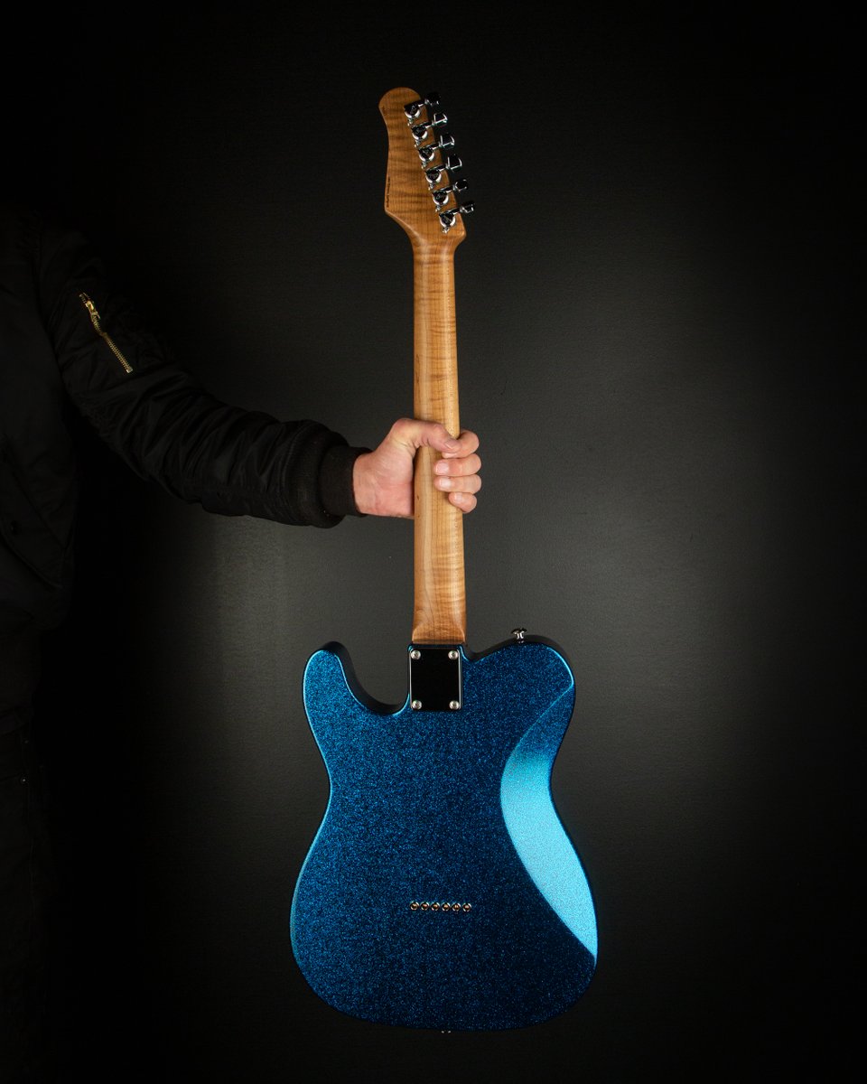 Custom Classic T built for Eddie’s Guitars! Find a dealer now at suhr.com/dealers. Instrument Specifications: Serial Number: 75321 Model: Classic T Finish: Blue Sparkle Wood: Swamp Ash Neck: Roasted Flame Maple Neck and Fingerboard #Suhr #SuhrCustom #SuhrGuitars