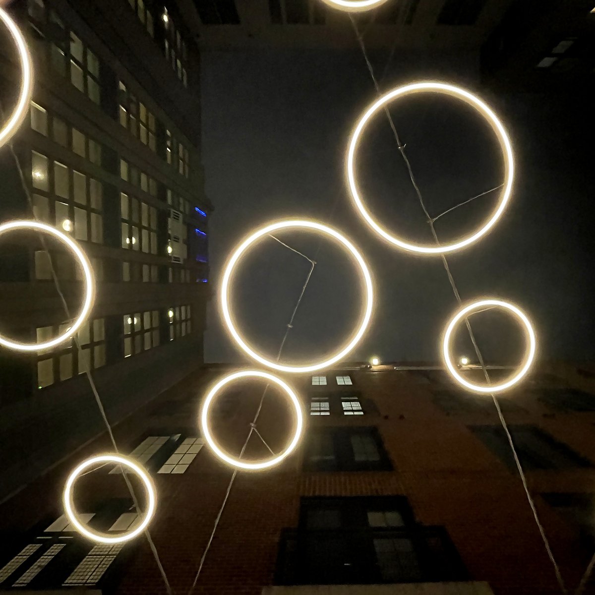 Saucers Over Bethesda Round
.
Looking up while walking along Bethesda Lane at night, you might see a cascading set of ring lights zooming above like glowing flying saucers.
.
05.02.24
#rounddujour #ringlights #bethesdalane #bethesdamaryland #flyingsaucers
RoundMuseum.com