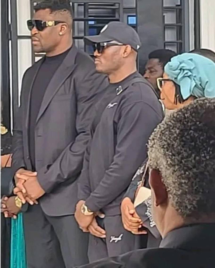 Kamaru Usman standing by Francis Ngannou’s side at his sons funeral today ❤️🇳🇬🇨🇲
