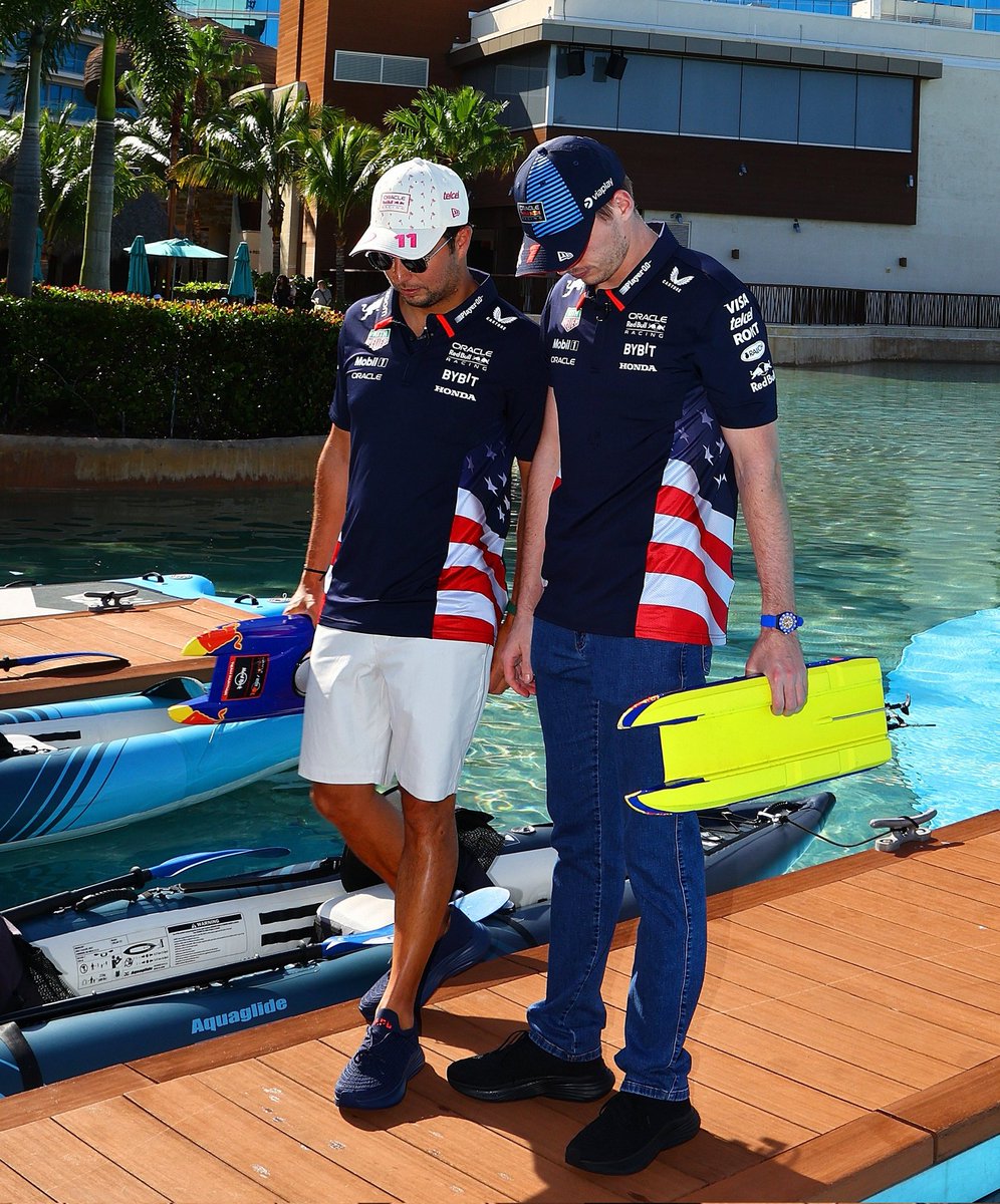 If I had a nickel for every picture where it looks like Max and Checo are holding hands, i'd have two nickels. Which isn't much but it's odd it has happened twice.