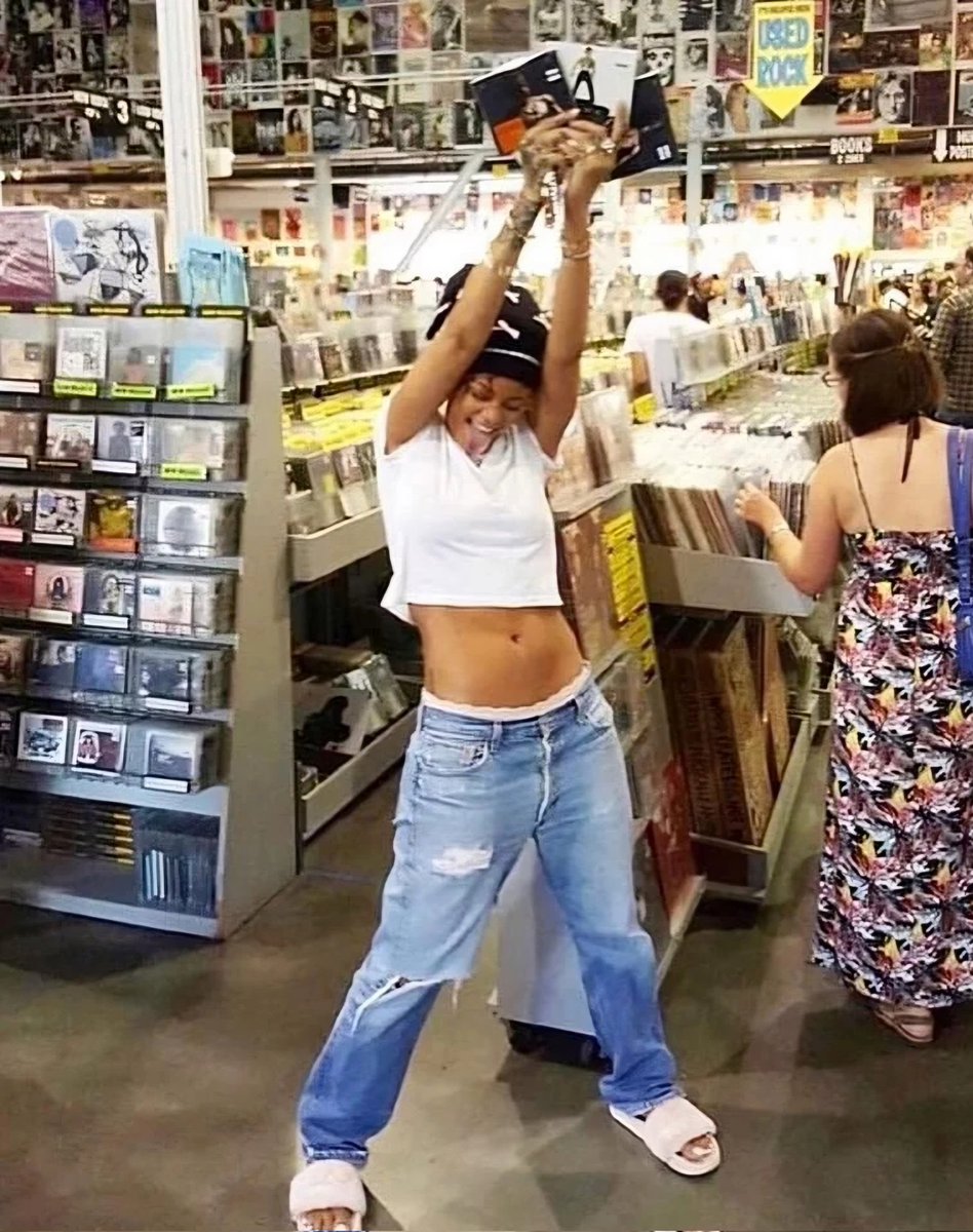 Rihanna with Rodeo CD from travis scott 🐐