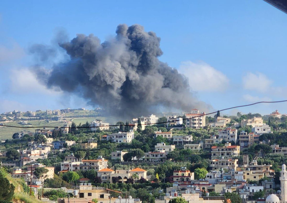 Israeli occupation launch an airstrike on the outskirts of the city of Bint Jbeil in southern Lebanon.