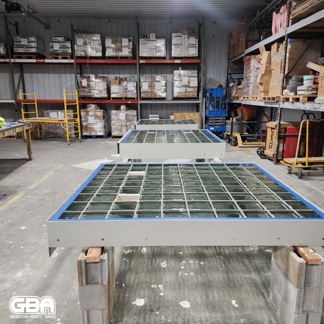 We're prefabricating engineered glass block windows with steel frames for maximum security at a detention center. These versatile windows can be easily installed, customized to fit any opening, and are ideal for facilities prioritizing natural lighting and safety. #glassblock