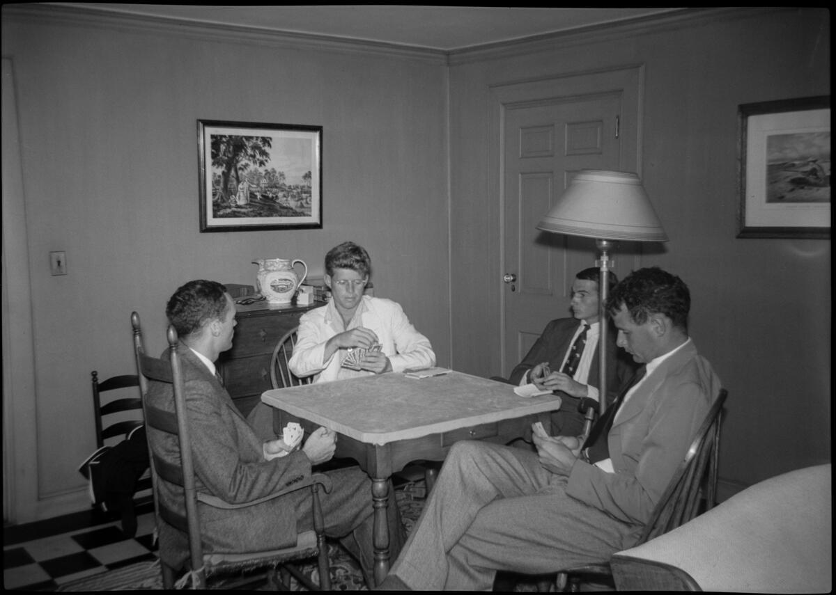 Playing cards- all in the family! JFK's grandfather P.J. Kennedy (2nd from left) plays cards in 1899, and JFK plays cards in Hyannis Port in 1941. Do you have a favorite card game to play? jfklibrary.org/asset-viewer/a… jfklibrary.org/asset-viewer/a… #ArchivesGames