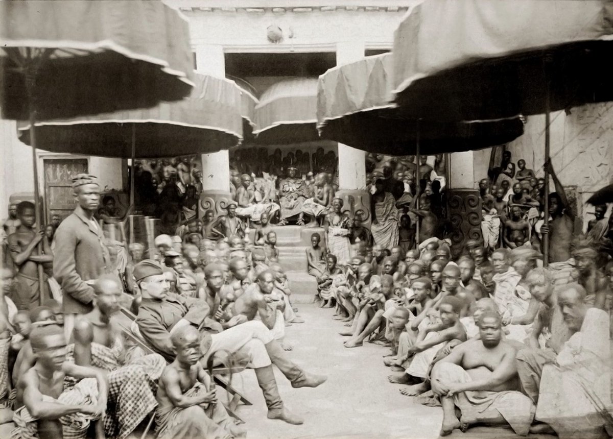 'King Kwaku Dua and the Golden Stool in Kumase, with attendants.' Date: 1880