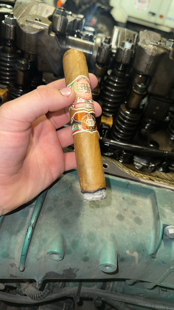 Smoking cigars while repairing engines couldn’t get any better