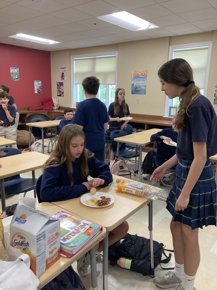 Hunger Banquet lesson after talking about Catholic Social Teachings! Students get different colored tickets and served different types of snacks that represent the distribution of wealth in our world. Every year, students react differently…always an important lesson!