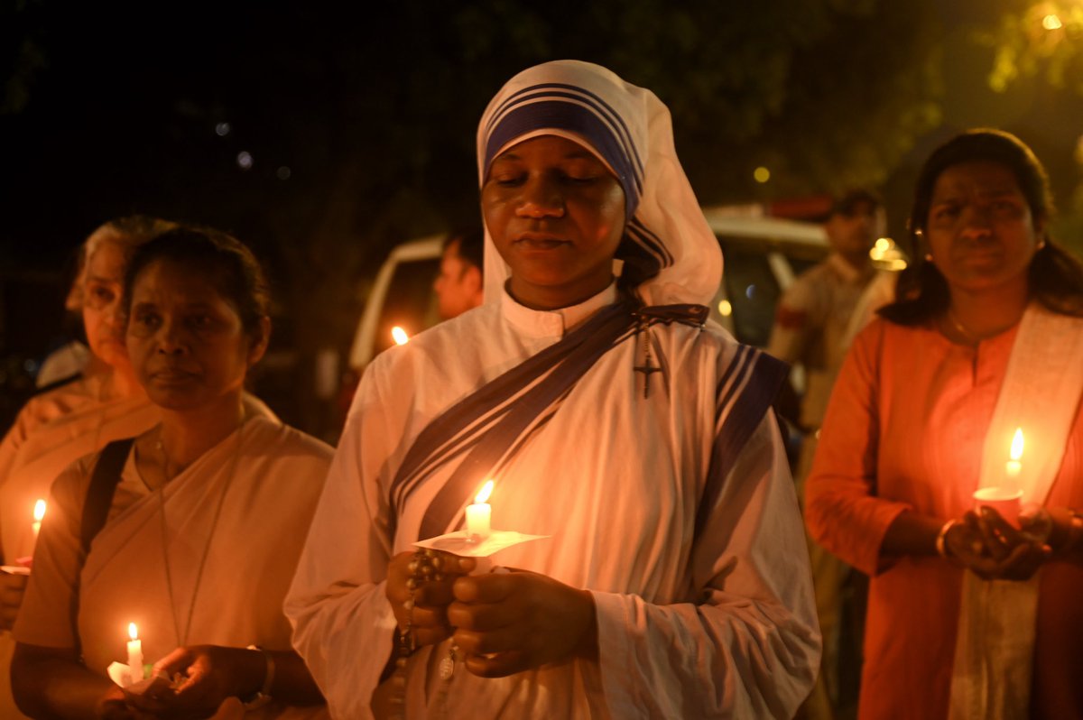 Nuns can be seen holding candles during a Candle Light Vigil on the 1 anniversary of the Manipur violence between Kuki-Zo and Meitei groups, In New Delhi, India on 3 May, 2024 . 
#Manipur_Violence #Kuki_Zo #candlelightvigil #1anniversary #Manipurconflict #nun