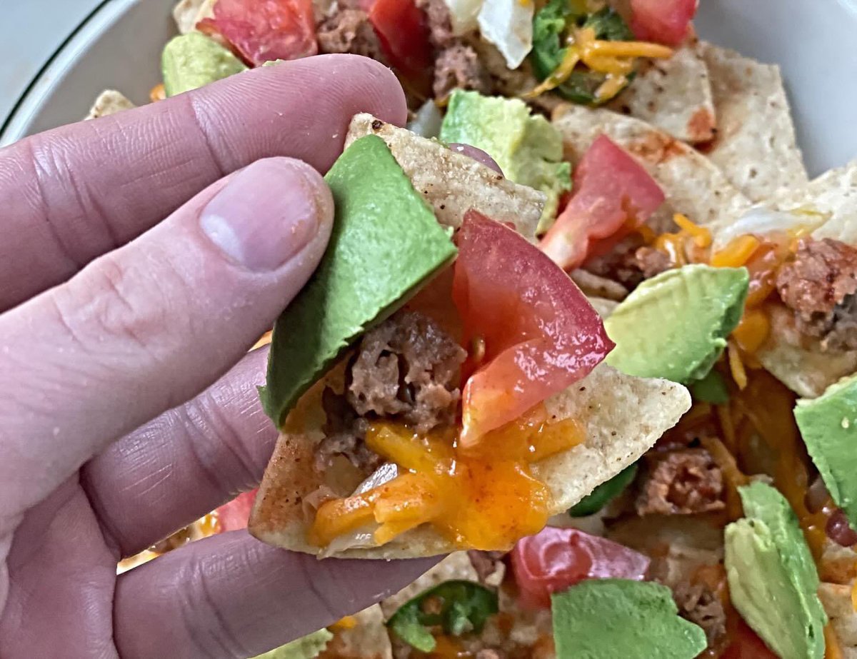 Vegan Nachos with Avocado, Beyond Sausage, Tortilla Chips, Cheeze, Tomato, Jalapeños, Onions & Hot Sauce! . . . . . #vegan #veganfood #veganism #plantbased #pdxvegans #portlandvegans #vegannachos #vegancheese #cheeze #beyondmeat #vegansausage