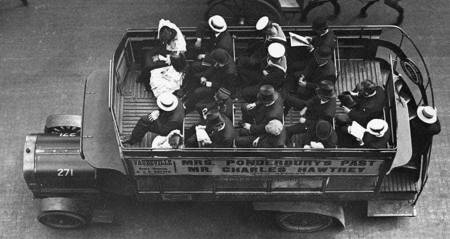 An unusual view of a London omnibus in Fleet Street, 1907. It looks as though the chap coming up the stairs will have to stand! The Charles Hawtrey mentioned on the side of the bus is the actor from whom the 'Carry On' star (born 1914) took his stage name. >FH