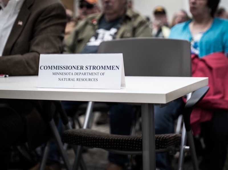 In a packed room, the only empty chair is where the MN Department of Natural Resources should be seated and answering questions about their wildlife management policies. Apparently they'd rather not engage with local voices on this issue.