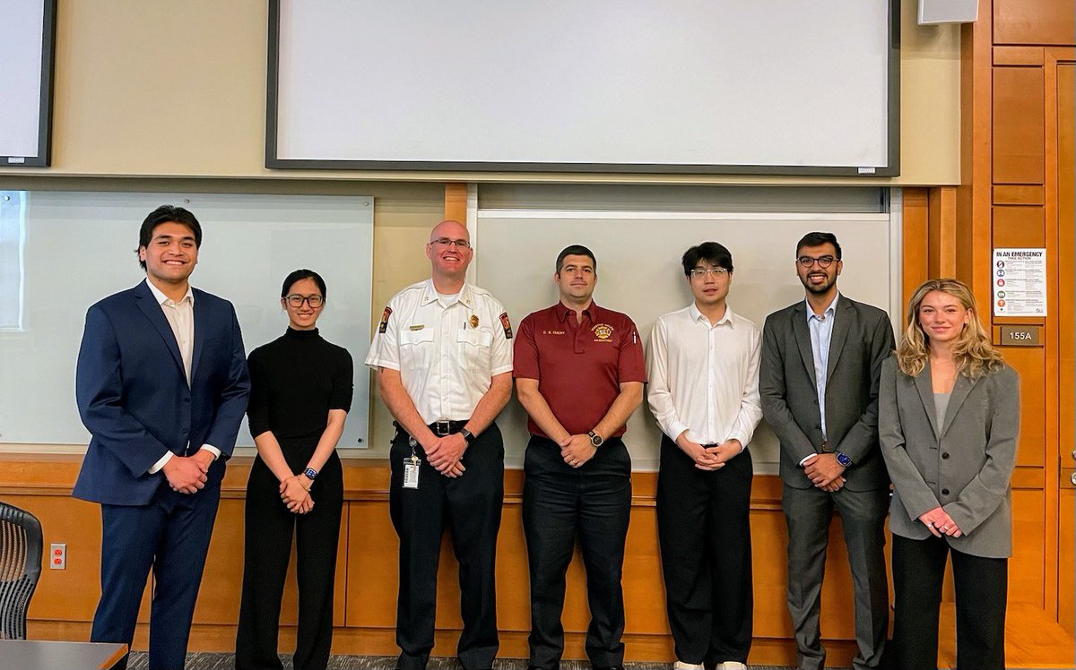 Asst. Chief A. Gray and Captain D. Emory with @WakeForest graduate student team in the Master of Science Business Analytics program. This talented team worked with the department to develop a real-time incident dashboard for our fire stations. Building for our future! #WSFire