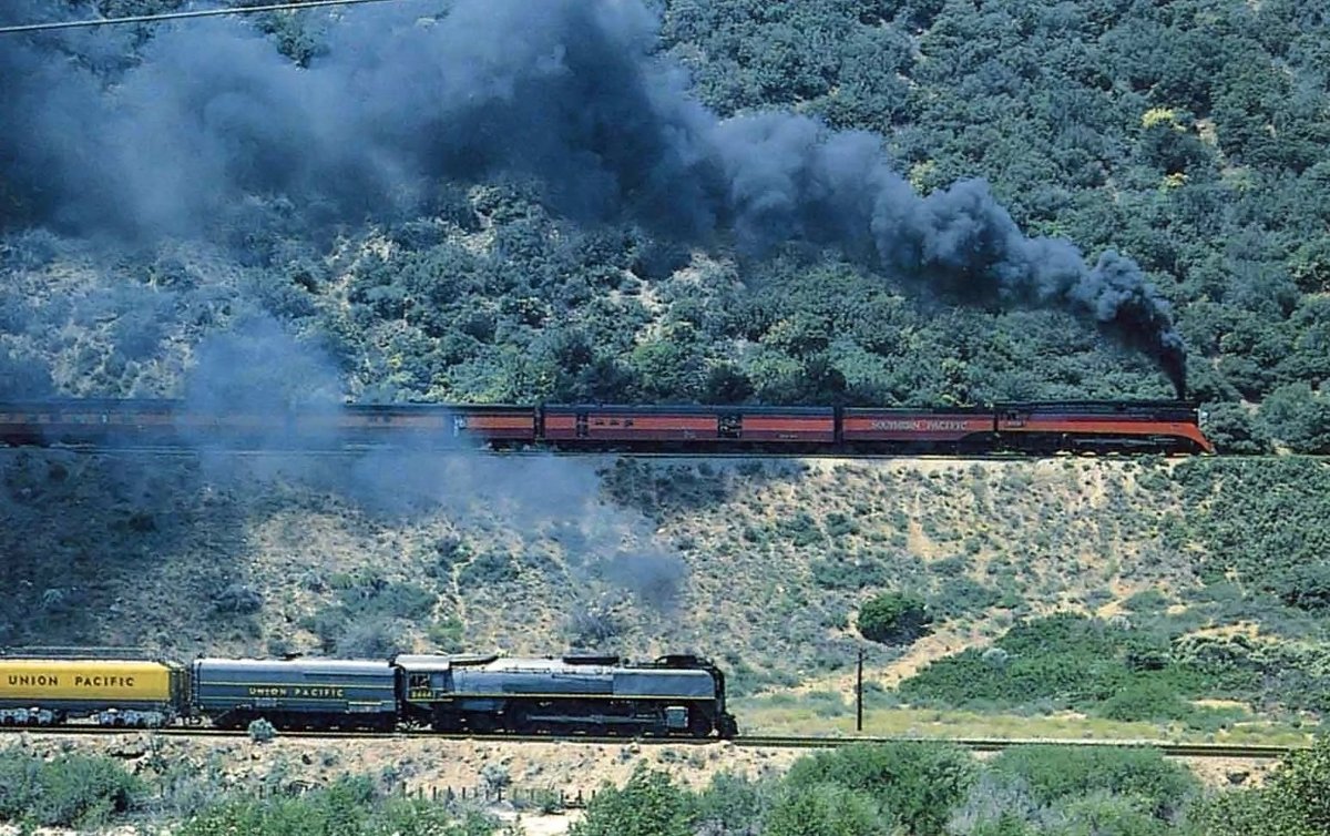 The famous 'race' between Southern Pacific 4-8-4 #4449 and Union Pacific 4-8-4 #8444 along Cajon Pass on May 8, 1989. This was part of Los Angeles Union Passenger Terminal's 50th Anniversary celebration. Paul Evans photo. american-rails.com/laupt.html