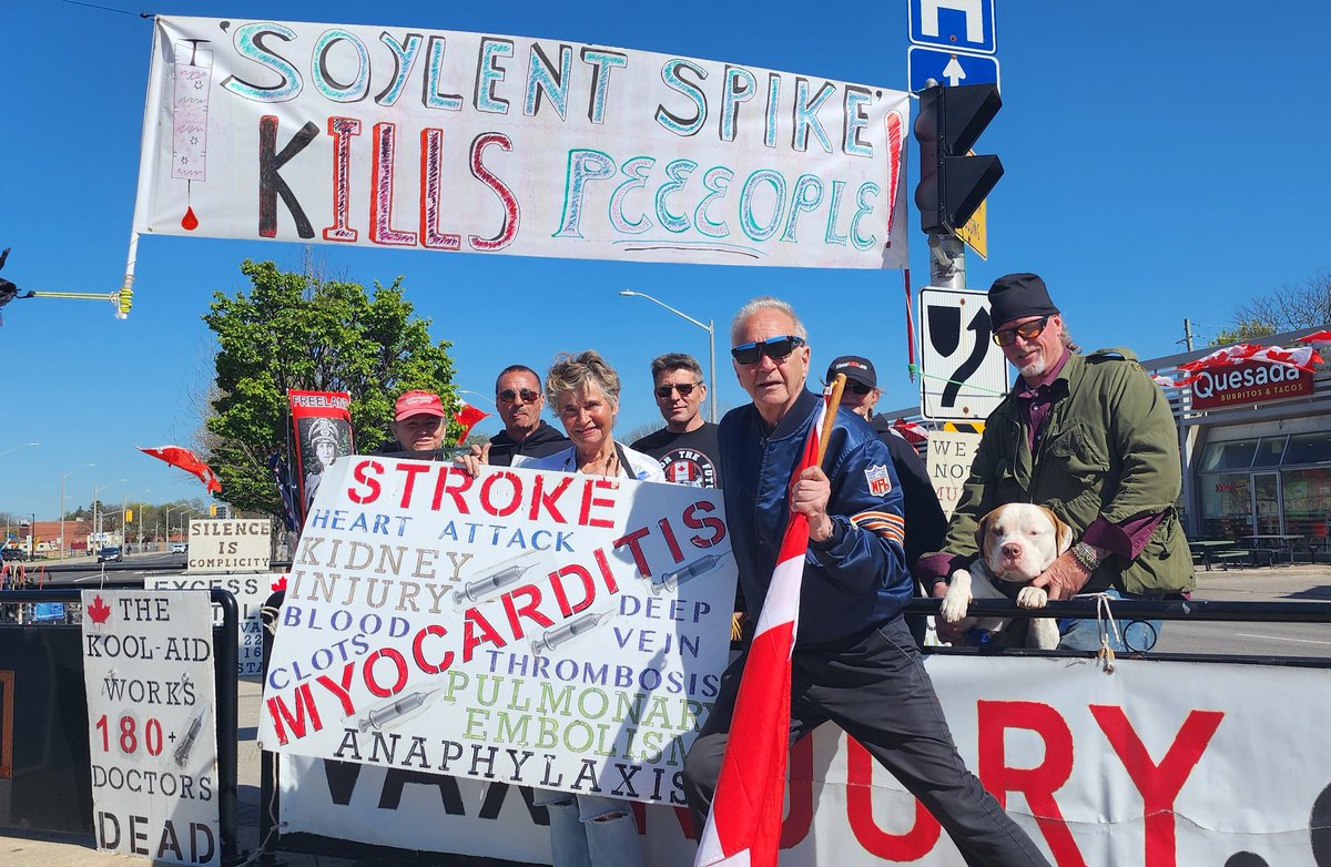 Here from YESTERDAY is picture of the people who put up the sign outside McMaster Health Centre. ANNA in the middle is the REAL HERO. She goes out to a separate location in Ontario 7 DAYS PER WEEK to inform people of what is on her sign. 'The Bourla Bomb' GIVES US BRAIN STROKE