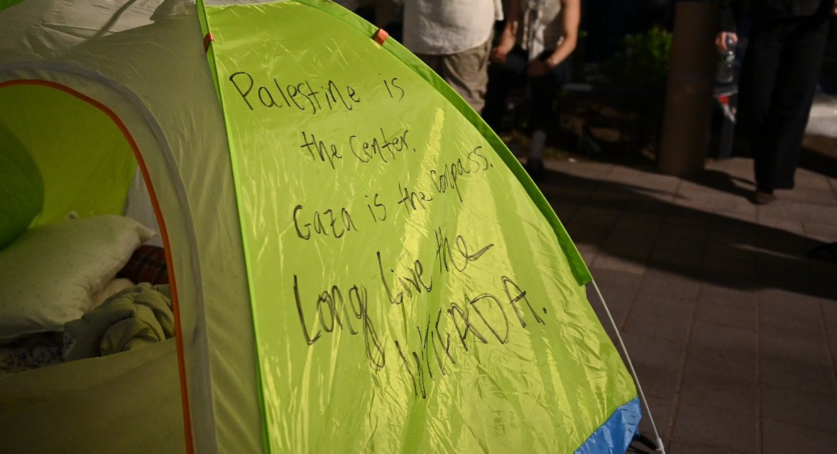 While I was there, students ate tacos delivered to camp — meat and veggie options, of course. Musicians visited and performed some songs to the camp across the barricades. Students held a ‘teach-in’ discussing what the phrase “Palestine is the center” means.