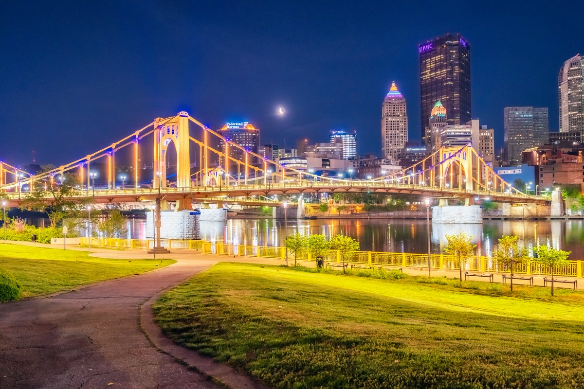 Another view in #Pittsburgh from this morning, this time from the North Shore before sunrise. The moon was coming up right over the Andy Warhol Bridge, and I composed the scene so that the path lead right to the bridge. Love how the bridges are always gold in the morning now too.
