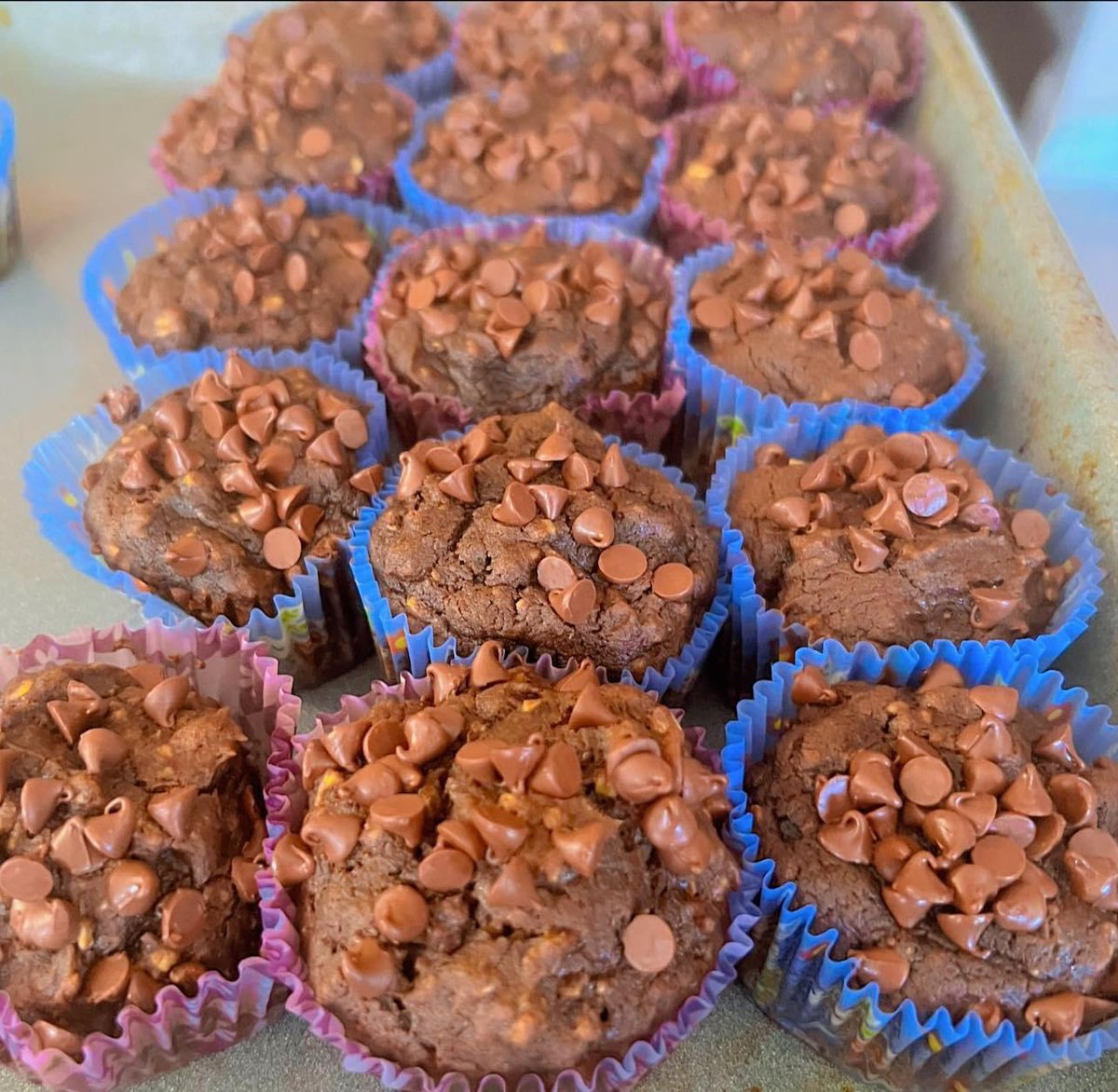 I made chocolate zucchini bread muffins and the kids love them. ❤ (They also have carrots in them.) Love how they do not have a ton of ingredients. 
Flour,
Oatmeal
Melted chocolate (used dark and semisweet)
Brown Sugar
Zucchini
Carrots
Coconut oil