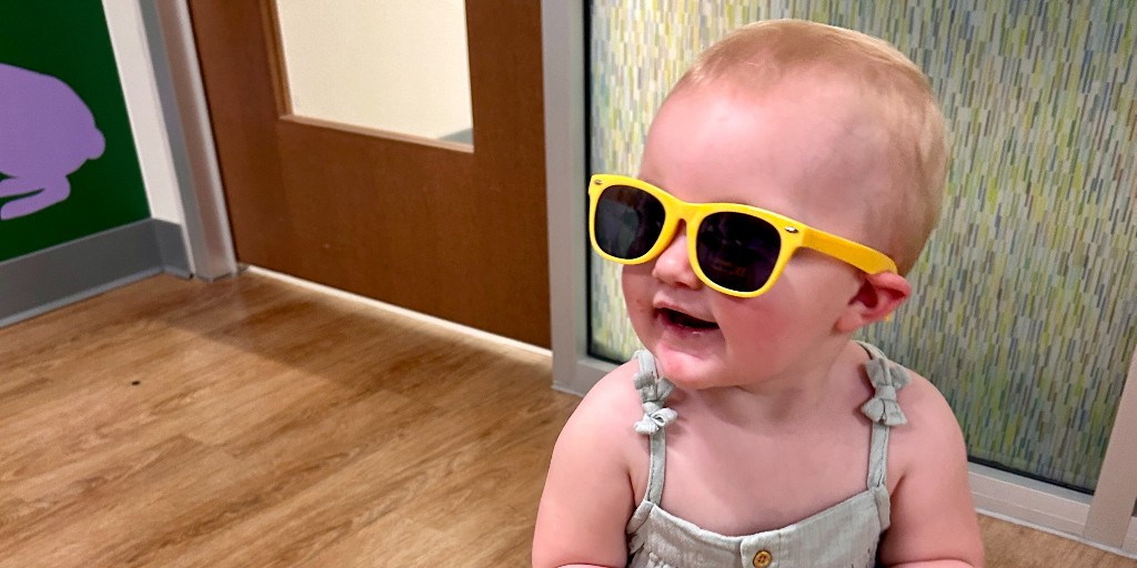Aurora is celebrating National 'Sun Day' with those yellow shades! She burned her hand after accidentally touching a hot grill. Aurora's mom took her to urgent care, and were referred to our burn care. After just one clinic appointment, Aurora's mom said she's glad they came.