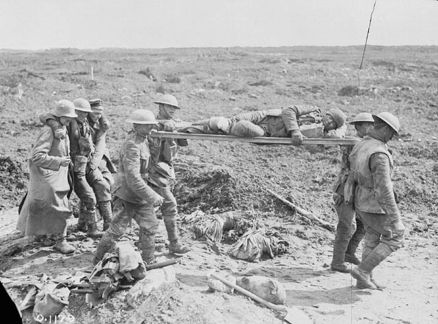 Stretcher bearers and German prisoners bringing in wounded at Vimy Ridge, during the Battle of Vimy Ridge. 9-12 April 1917.

amzn.to/3yc3j0F