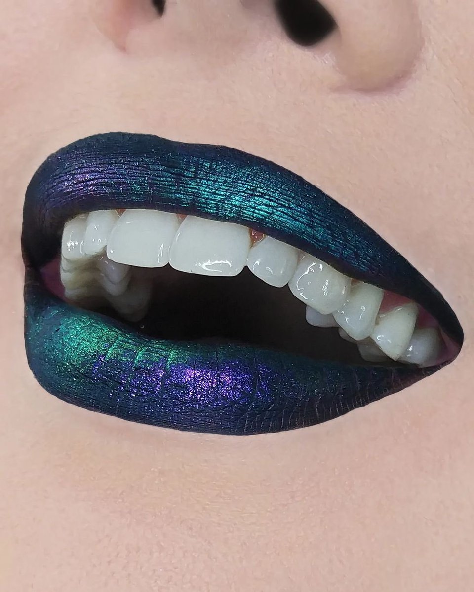 Zero lipstick is the best matte black base for all your lip art, as demoed by @themirrorbeauty ! 🖤 She created this stunner using Zero with @juviasplace @bernovich_ eyeshadows on top. 😍 #sugarpill #blacklipstick #ravemakeup #festivalmakeup #duochromemakeup #gothmakeup