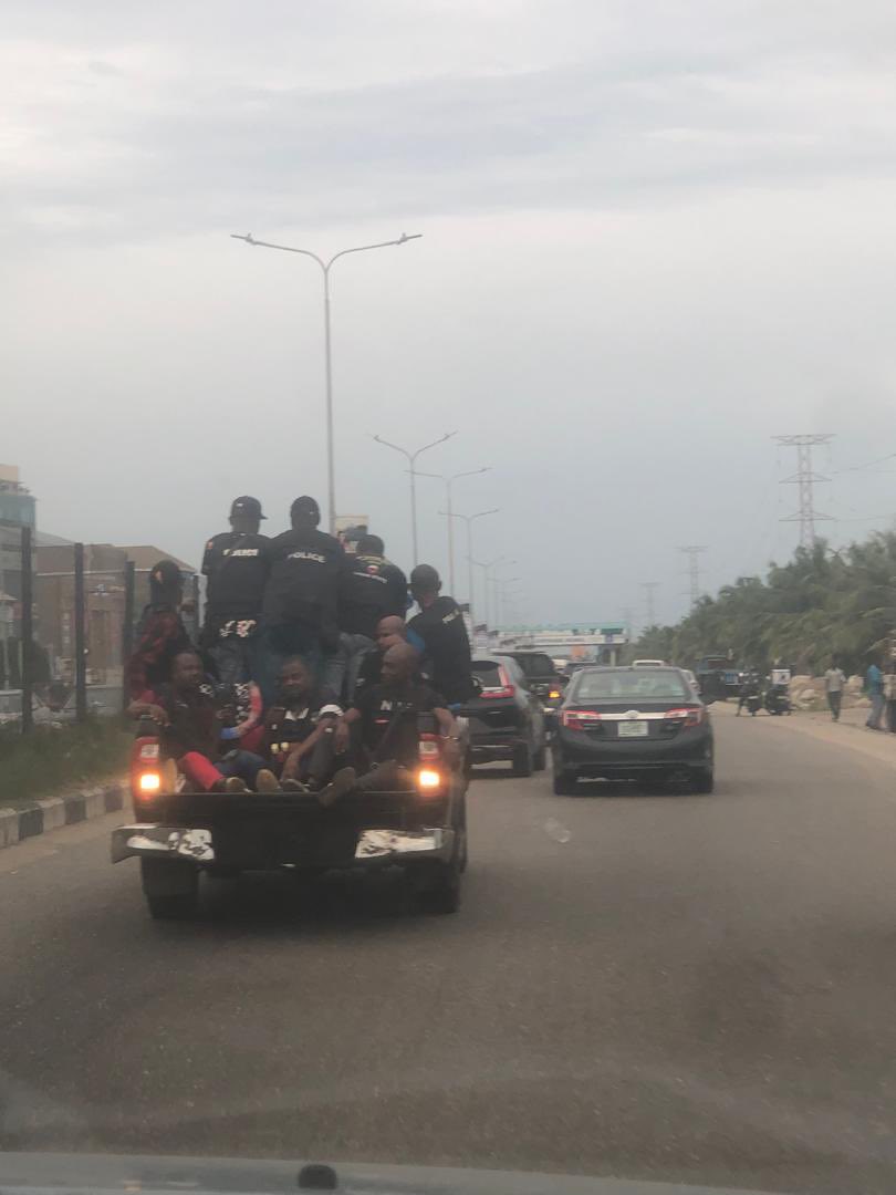 The police going in convoy that scattered my car bumper without dragging road at Jakande traffic light lekki this evening still threatening with gun. Na God go judge una