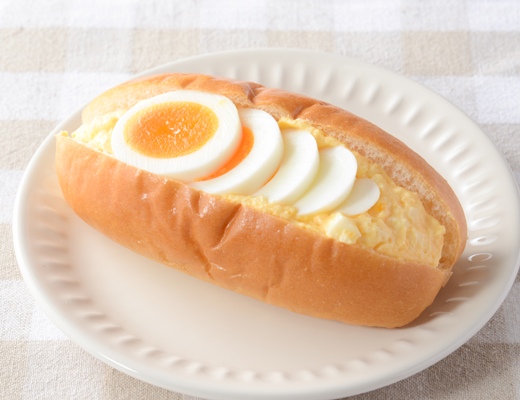 Lawson unleashes a TRIPLE egg salad sandwich with egg salad, hard-boiled eggs, and an egg yolk sauce.