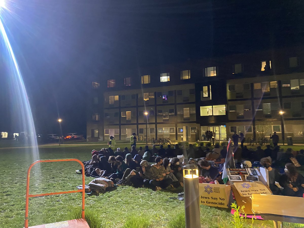 This is what the suny Purchase students looked like before being descended upon by police and swat teams from all over westchester- dead silent, sitting in a circle. I was arrested while filming the violent suppression of our students rights to exist on the campus they live on.